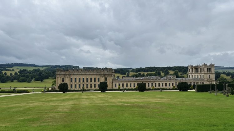 A view across the gardens towards the back of Chatsworth House – a stunning stone stately home.