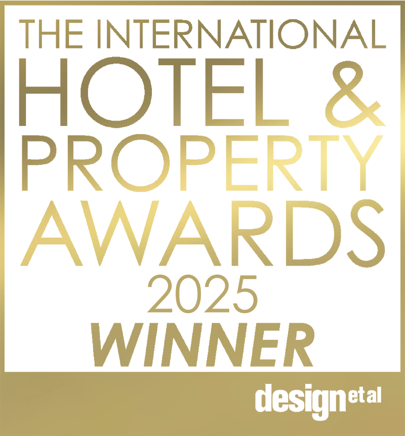 Logo on white background with gold lettering which says 'Hotel & Property Awards 2025 Winner'