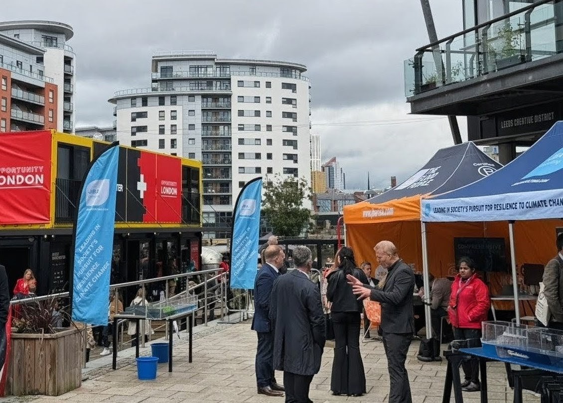 A photograph of UKREiiF taken by Nik with the high rise buildings of Leeds in the background (including Morrison Design’s student accommodation project).